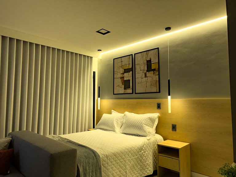 64B Studio premium aconchegante com sofá-cama